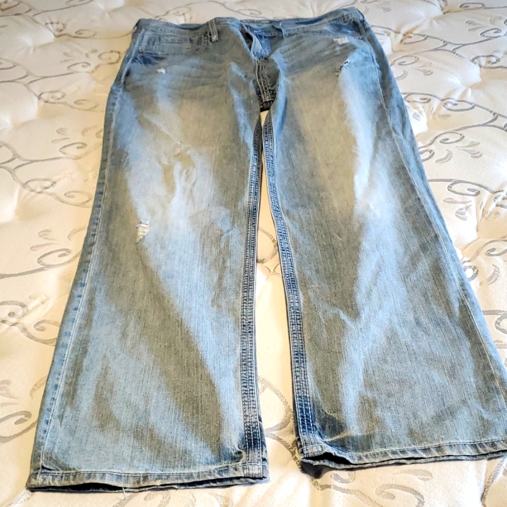 Buckle brand mens jeans/size 38R/Seth/blue in color/slightly used/ great conditi